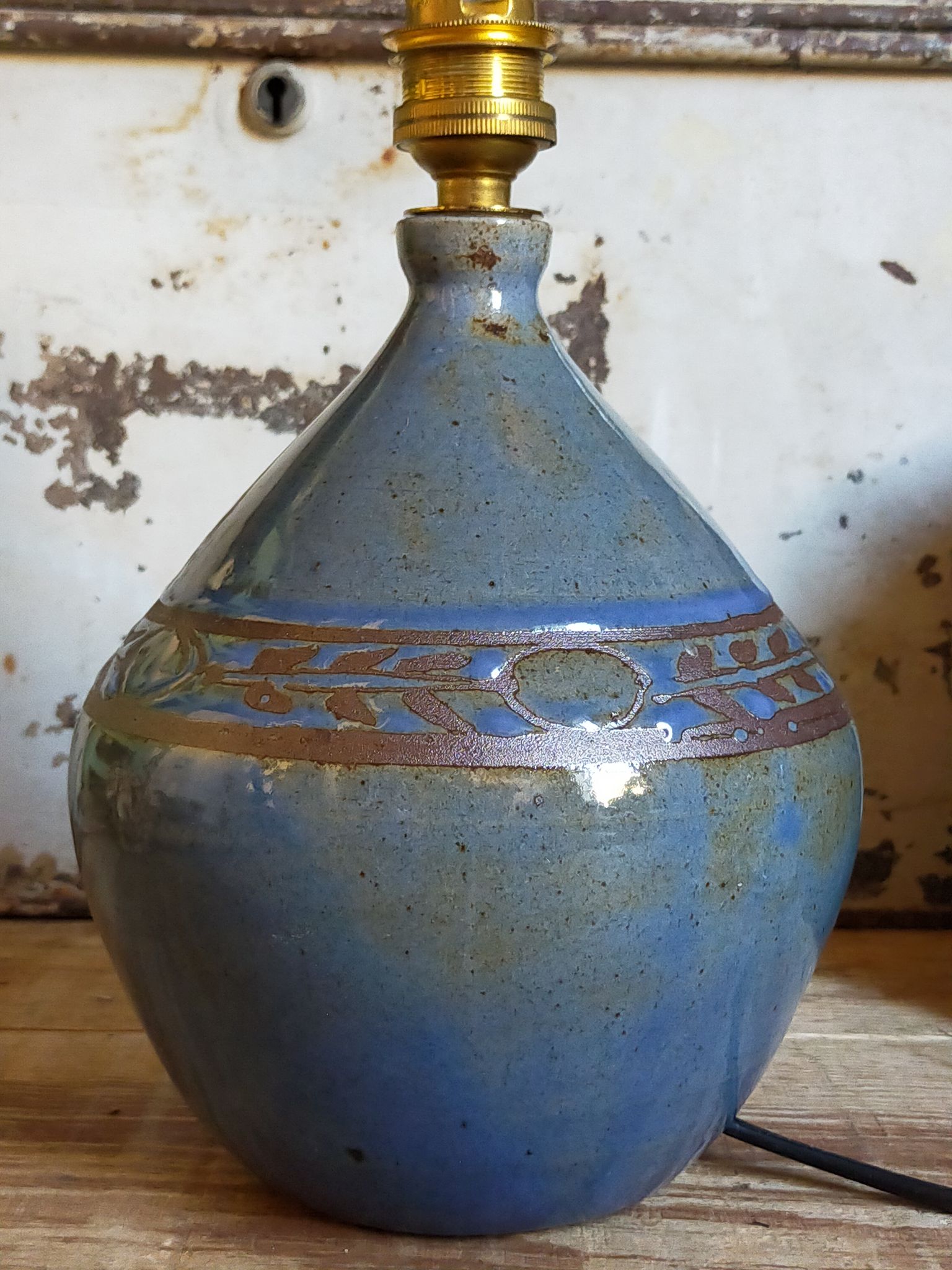 Vintage potter's ceramic table lamp, raffia lampshade