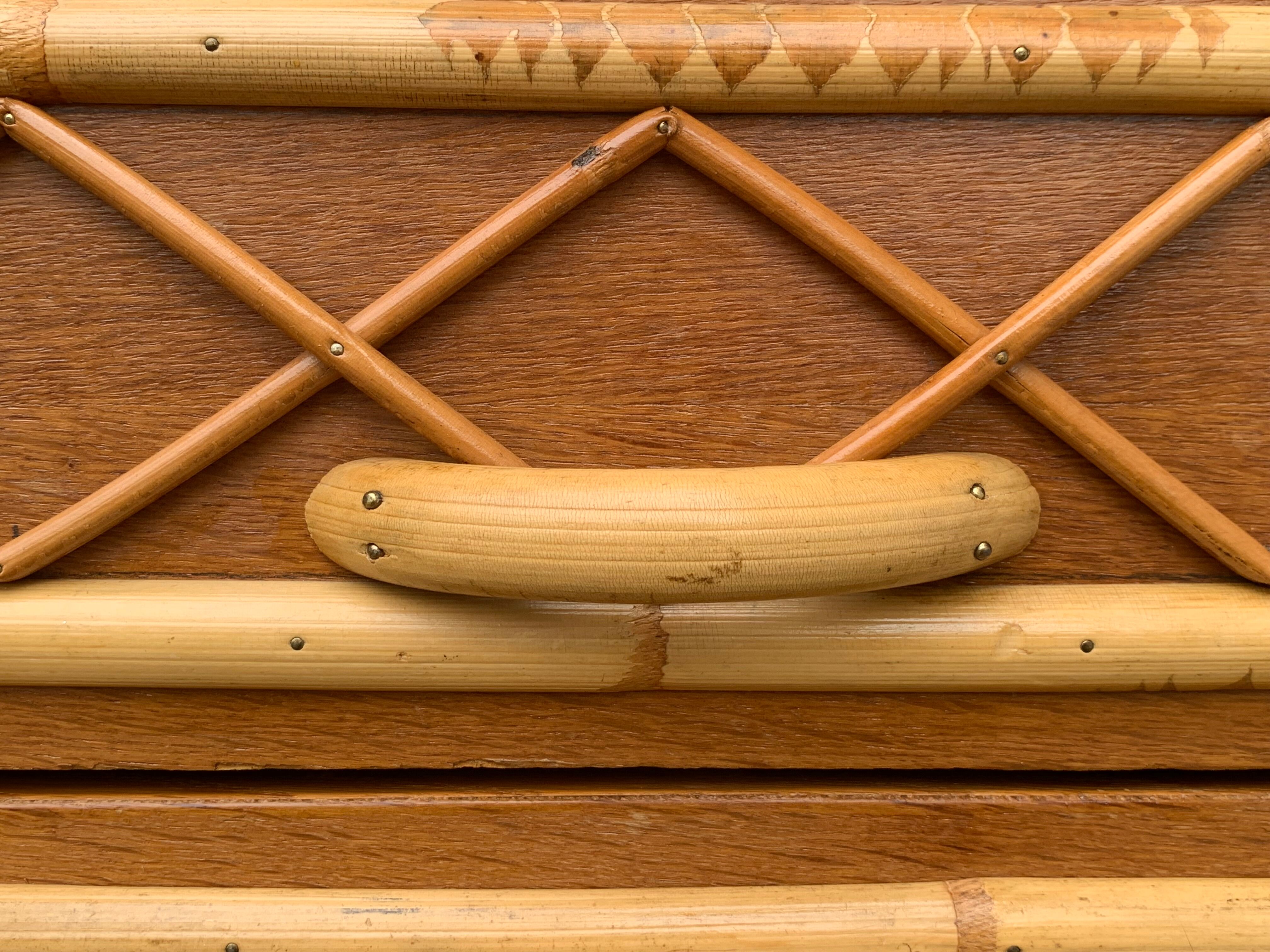Rattan wardrobe with tapered legs from the 1960s.