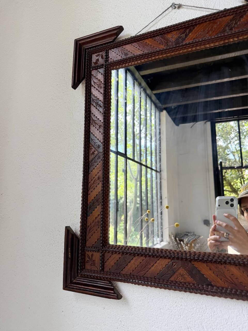 Pair of wooden mirrors in tramp art style