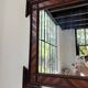 Pair of wooden mirrors in tramp art style