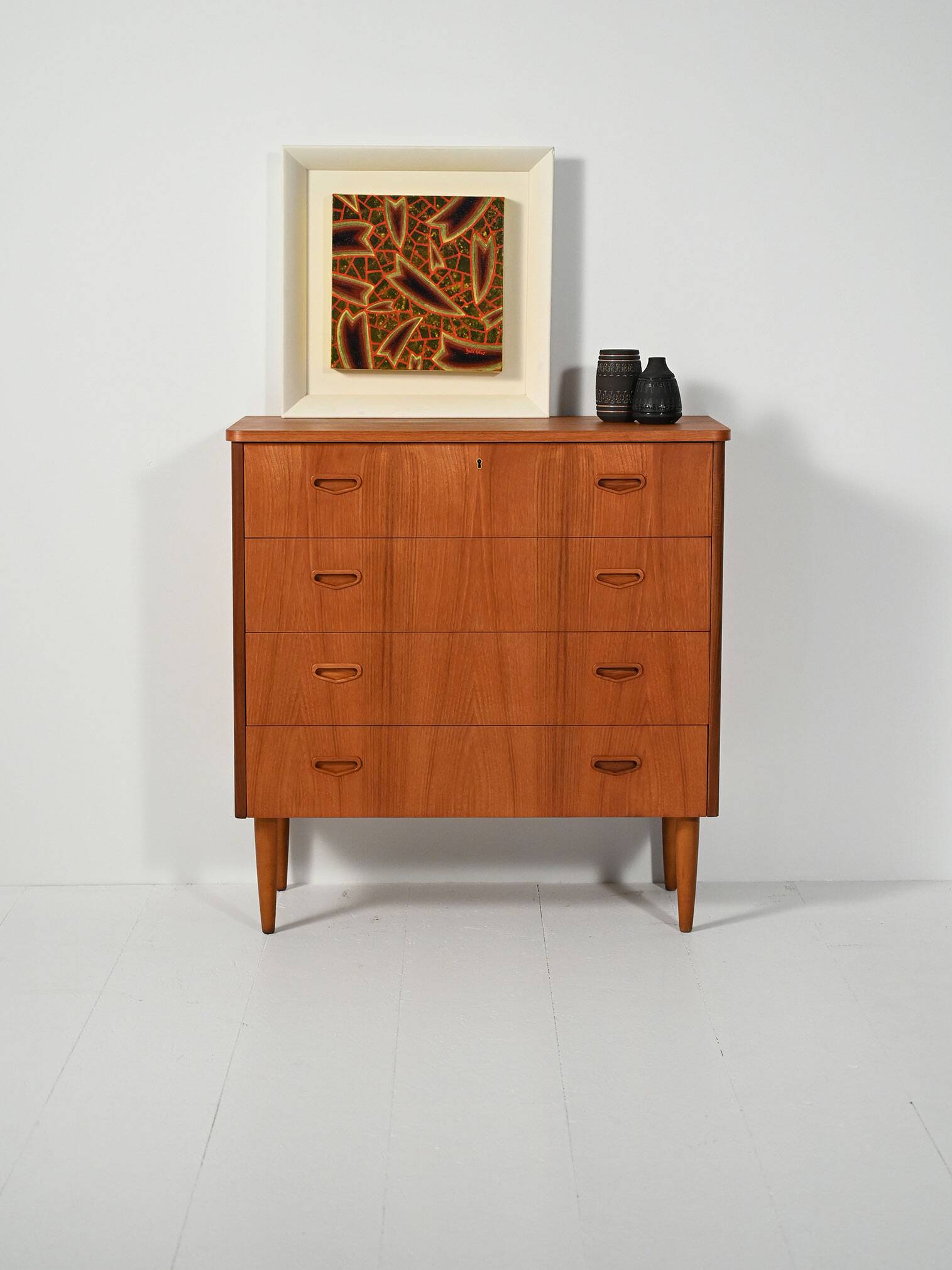 Scandinavian teak chest of drawers with sculpted recessed pulls