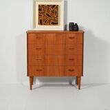 Scandinavian teak chest of drawers with sculpted recessed pulls