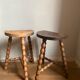 Pair of wooden milkman's stools turned brutalist