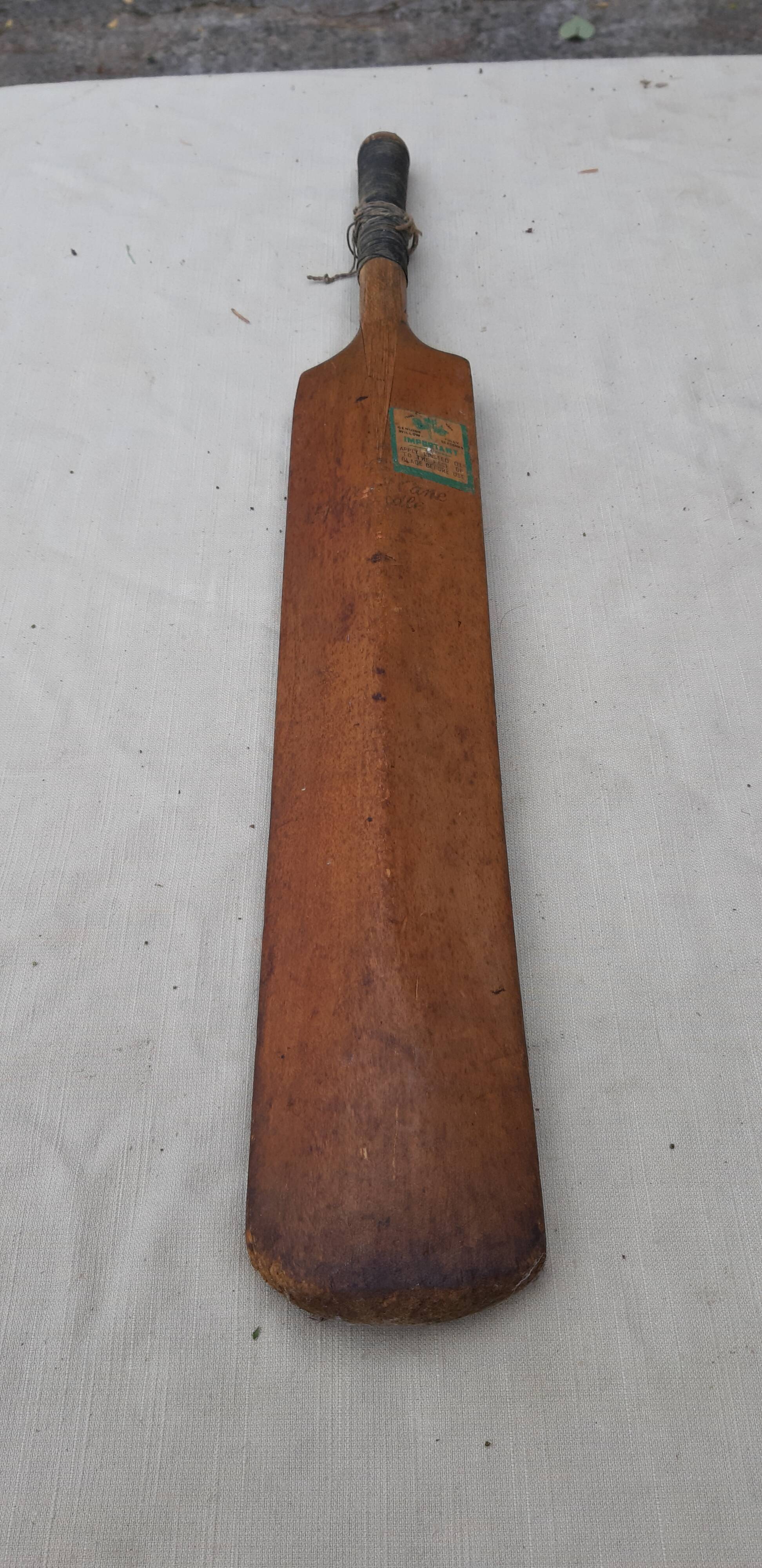 Ancient cricket bat in wood