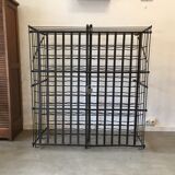 wine in metal cage wine cellar