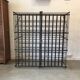 wine in metal cage wine cellar