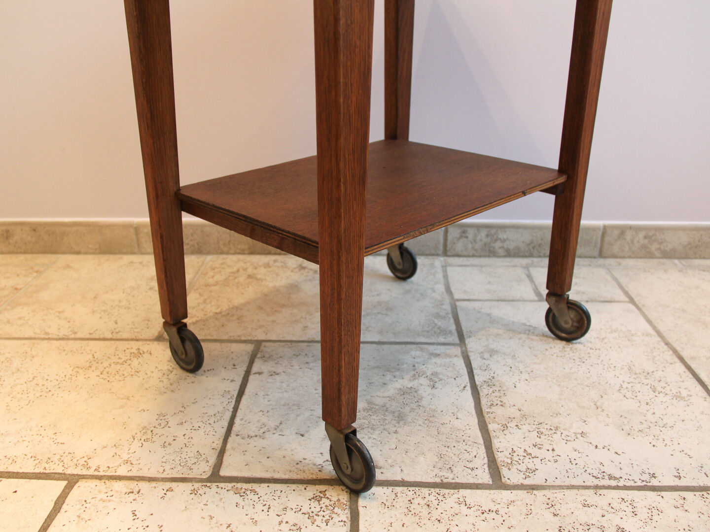 Worker green wood feet wheels