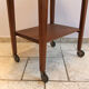 Travailleuse en bois verte pieds roulettes