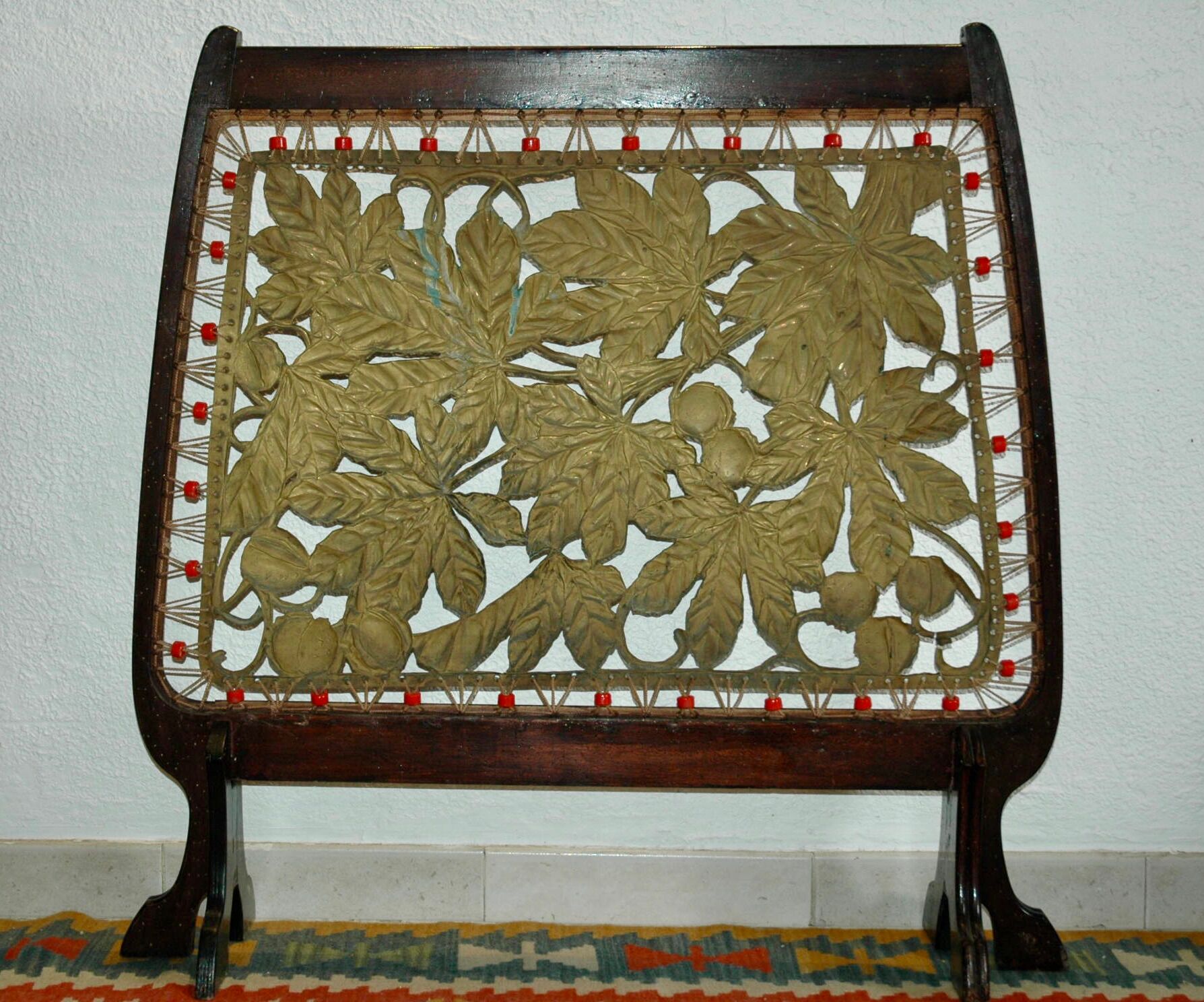 Art-new wooden and brass firewall