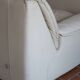 Cinna armchair in cream leather, bolstered armrests, 1970s.