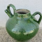 Antique glazed green terracotta oil jar, late 19th century.