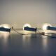 Set of 3 semi-transparent glass and white metal wall lights, 1960, Germany