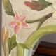 Carved wooden mirror, colourful floral decoration.