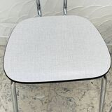 Set of two vintage grey Formica and chrome chairs.