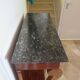 Empire/Restoration style console table with scrolled ends, mirrored back, and claw feet.