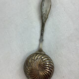 Old sprinkling spoon