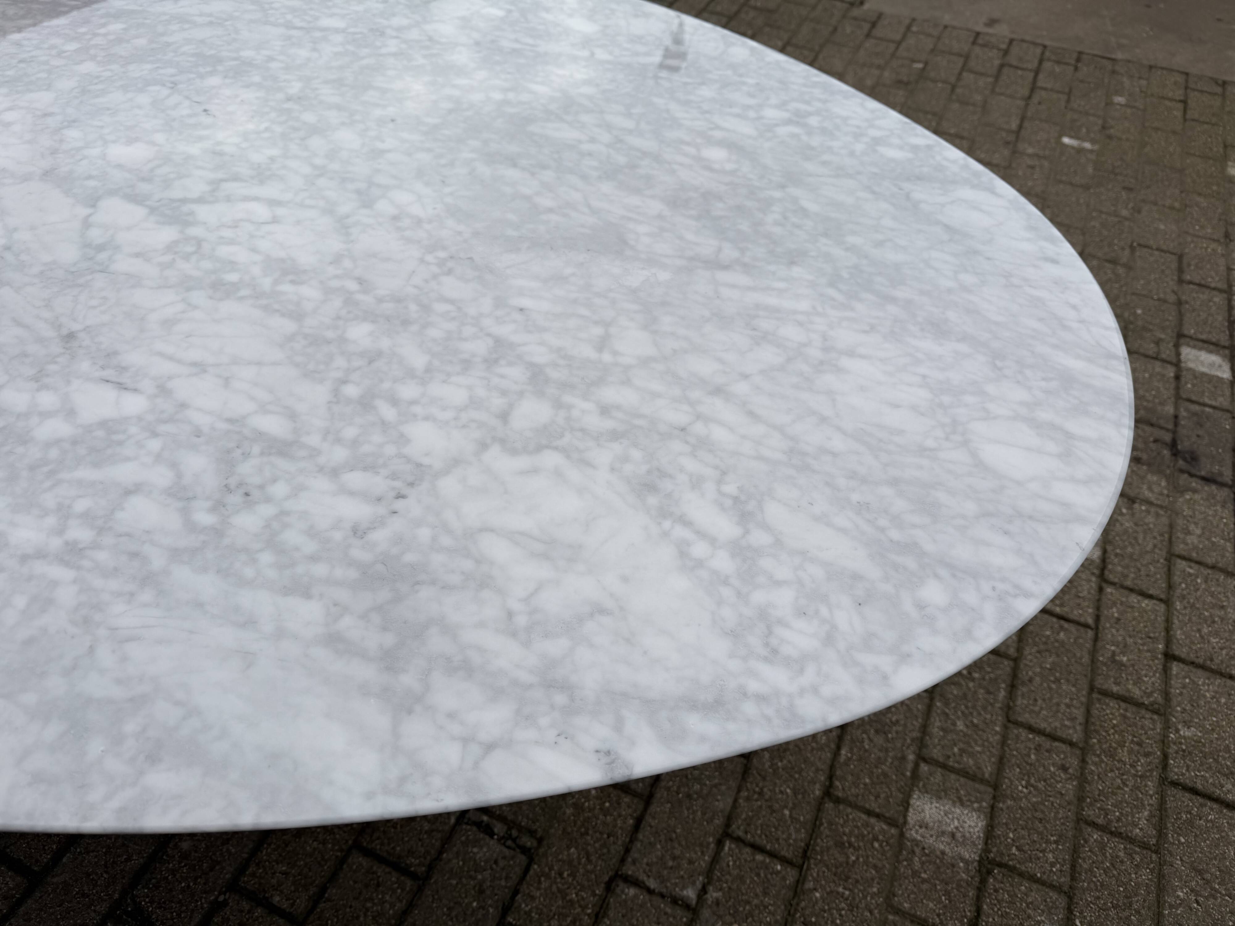 Original Knoll Tulip oval dining table (244cm) in Carrara marble.