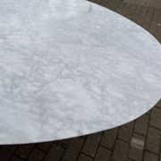 Original Knoll Tulip oval dining table (244cm) in Carrara marble.