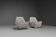 Pair of fabric and stainless steel lounge chairs by Gianni Moscatelli
