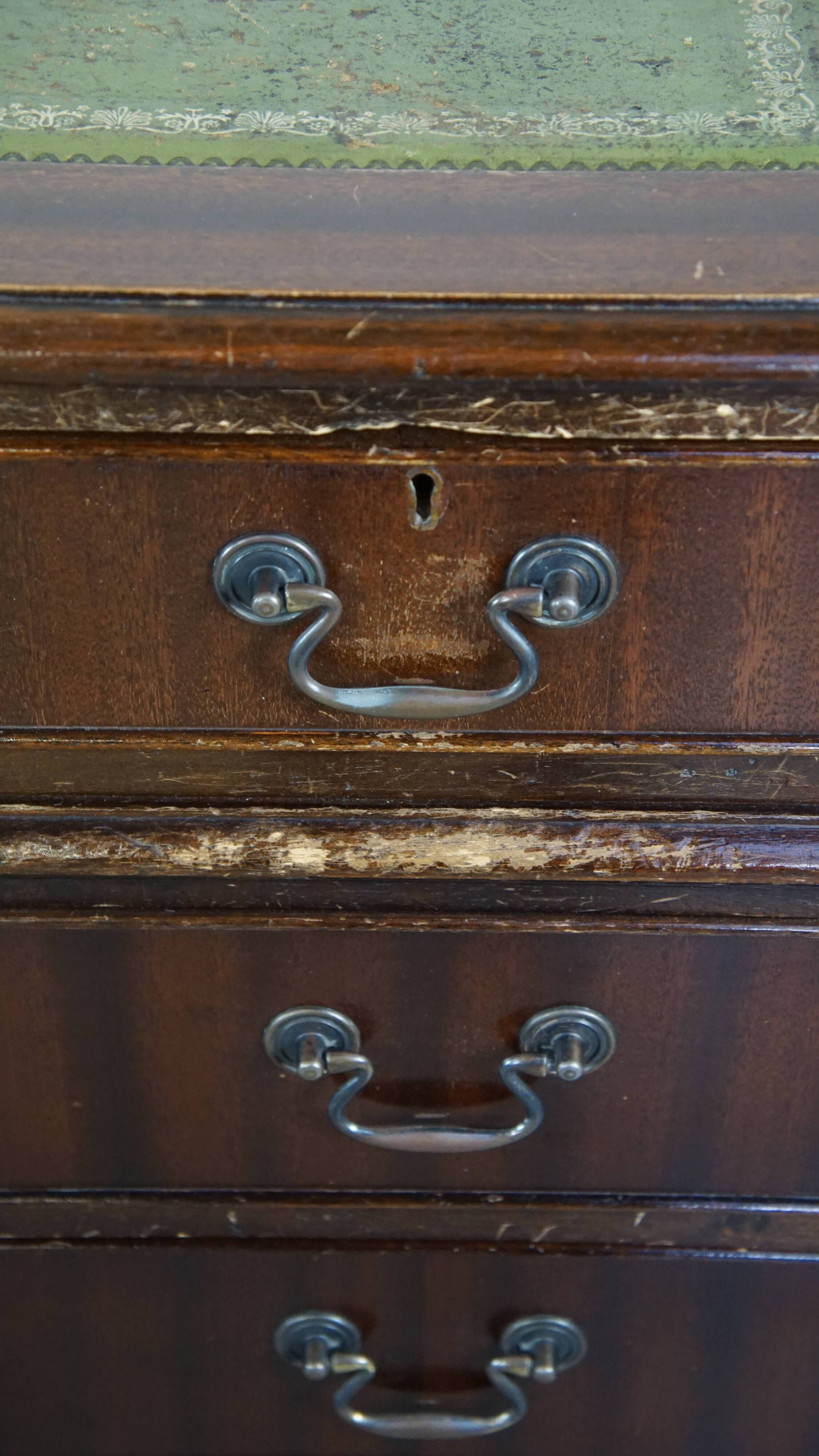 English style chesterfield desk with patina and a green leather top