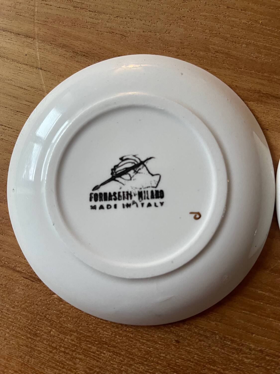 Small Fornasetti plates