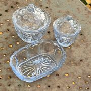 Lot consisting of 3 glassware, lavender blue, two jars with lids and a pocket emptier, vintage