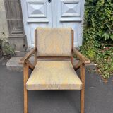 Vintage wooden armchair from the 1960s