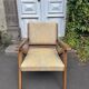 Vintage wooden armchair from the 1960s
