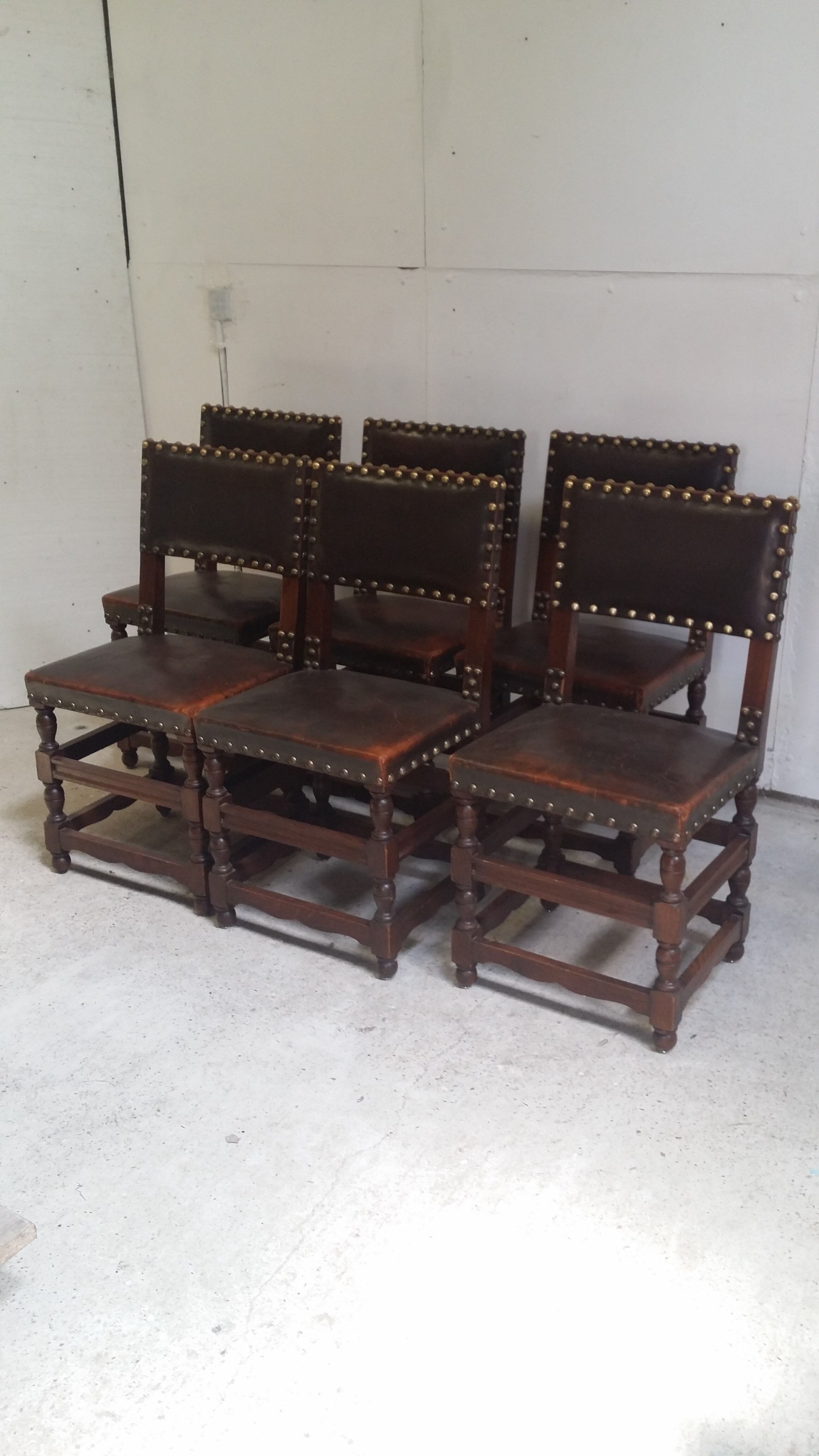 a set of six leather chairs and nails