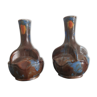 Pair of vases in enamelled sandstone