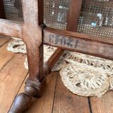 Piano bench seat in cane