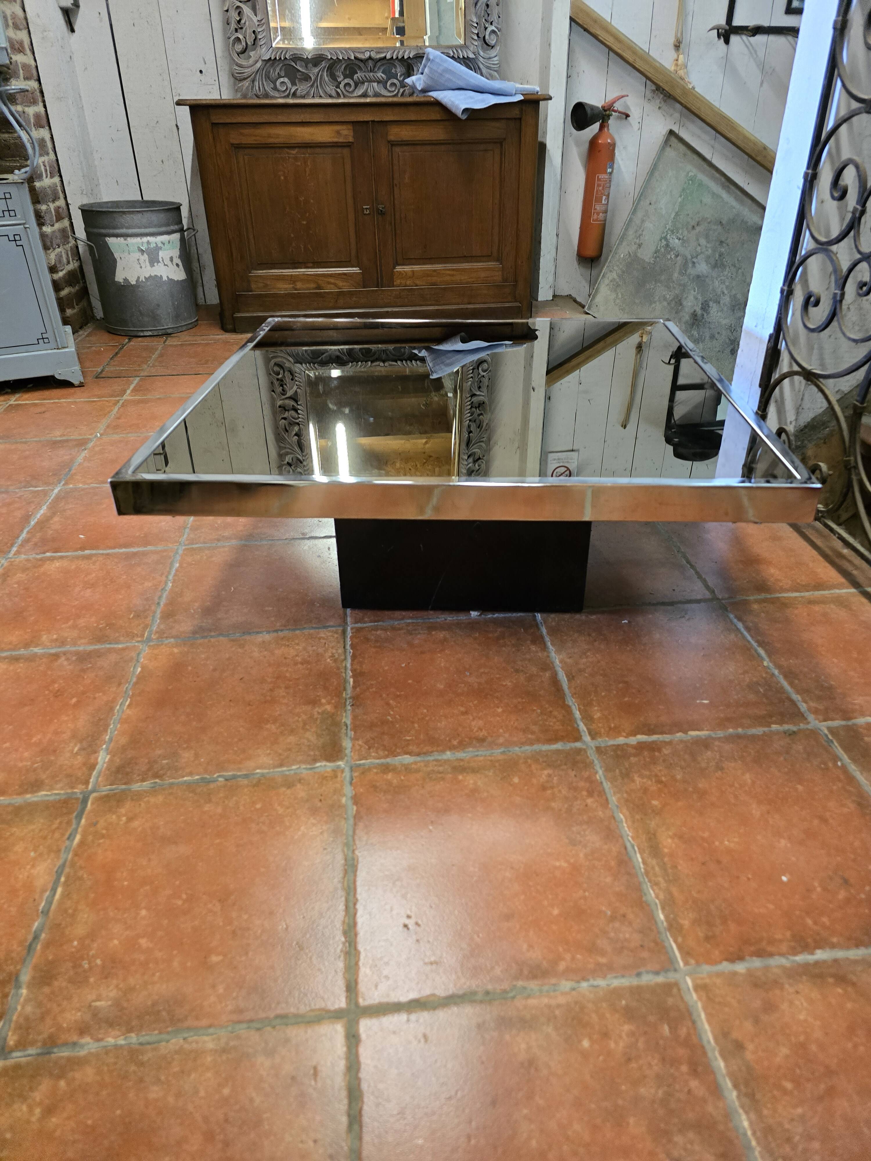 Chrome coffee table with smoked mirror top
