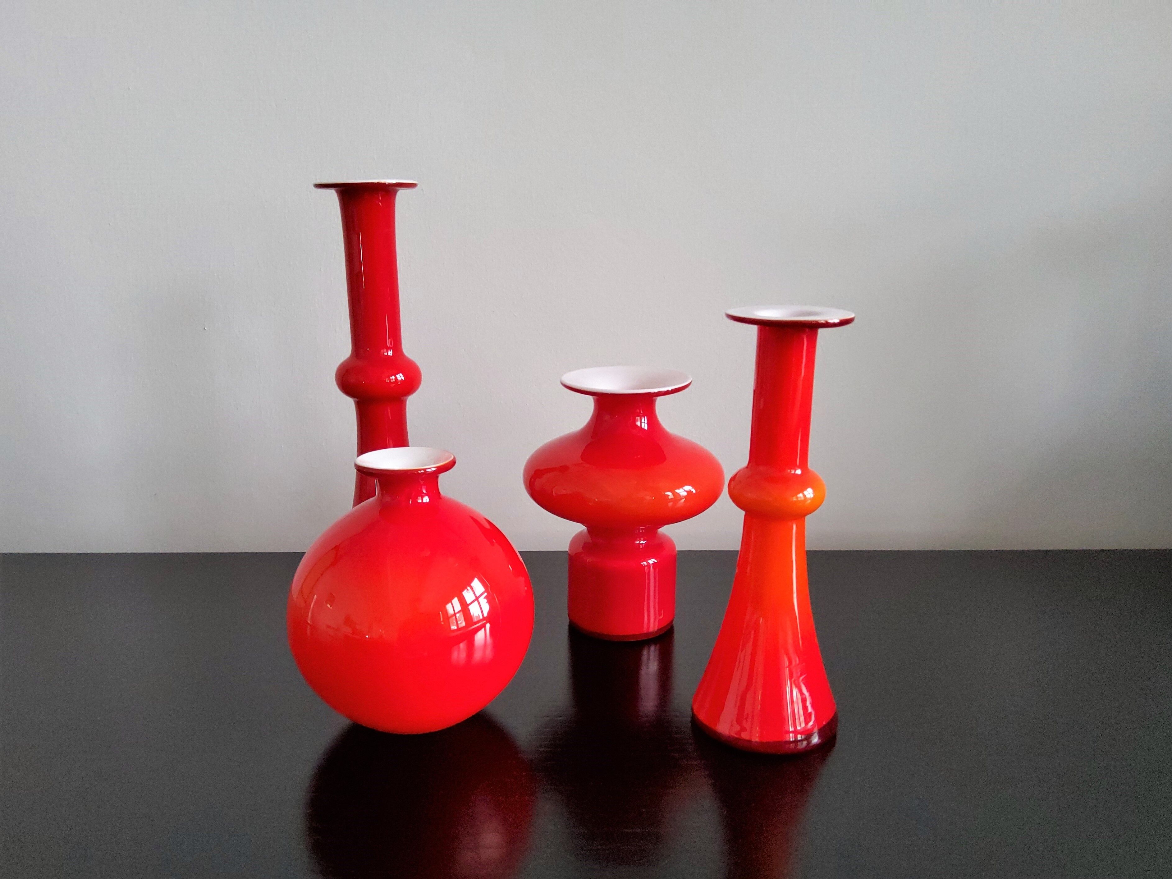 Arrangement of 4 red glass 'Carnaby' vases by Per Lütken for Holmegaard, Denmark 1960's