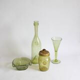 Biot bubble glass ensemble, bottle, jar, bowl and glass.