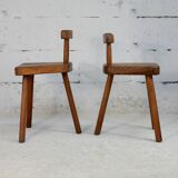 Pair of tripod stools with brutalist backrests, France, circa 1960