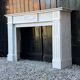 Louis XVI style fireplace in white Carrara marble, circa 1880.