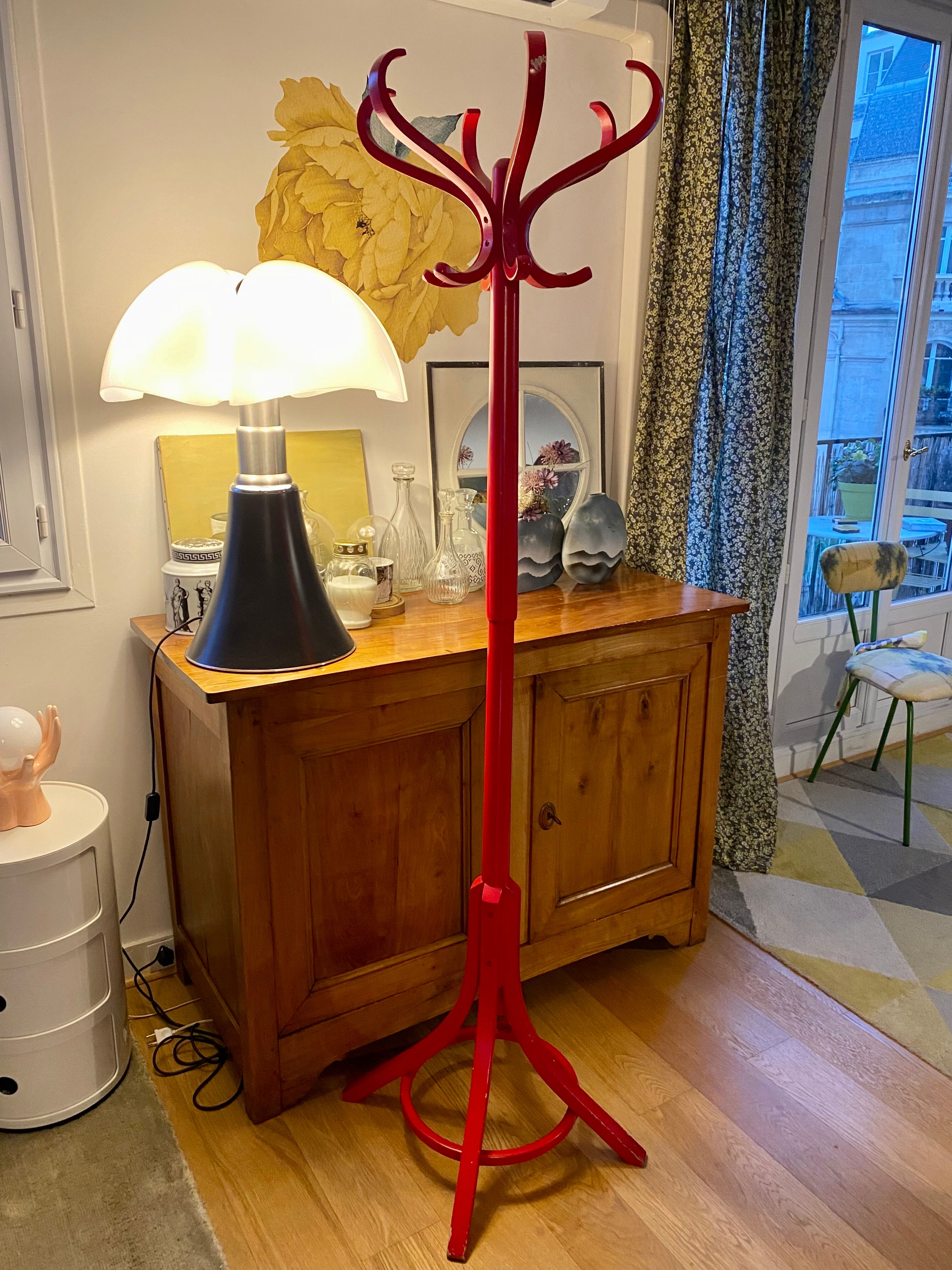 Red Baumann parrot coat rack