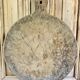 Old large round pizza cutting board