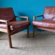 Pair of oak faults with tawny leather cushion. Denmark 1960