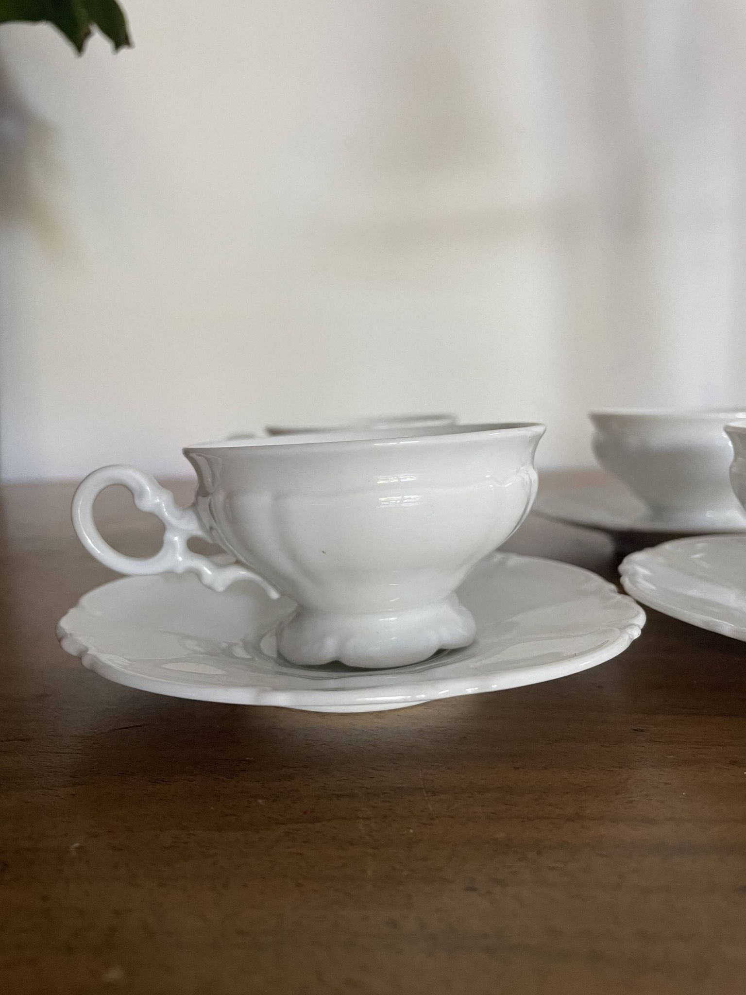 Set of 4 Hutschenreuther fine porcelain cups and saucers.