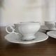 Set of 4 Hutschenreuther fine porcelain cups and saucers.