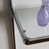Chrome and glass wall shelf, circa 1960