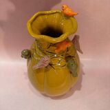 Yellow vase decorated with birds