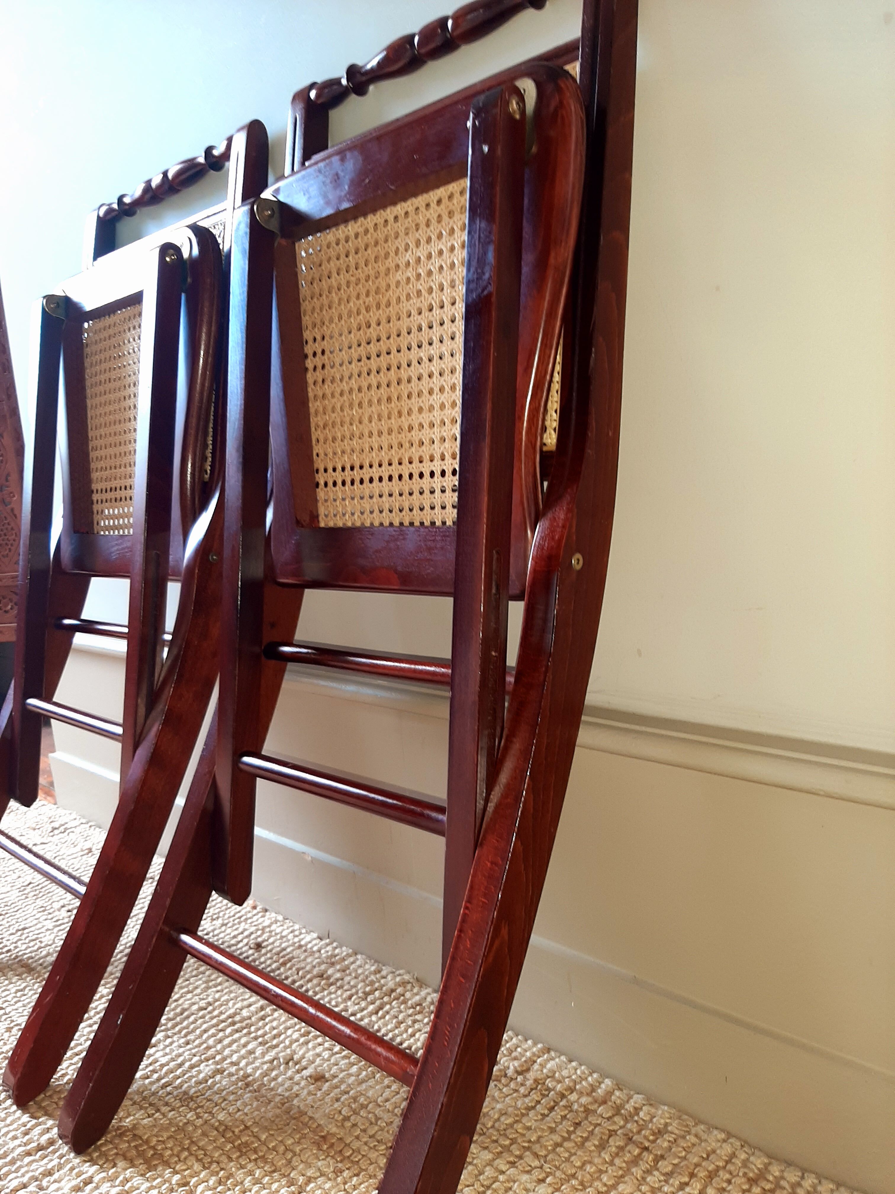 Folding wooden chairs and cannage