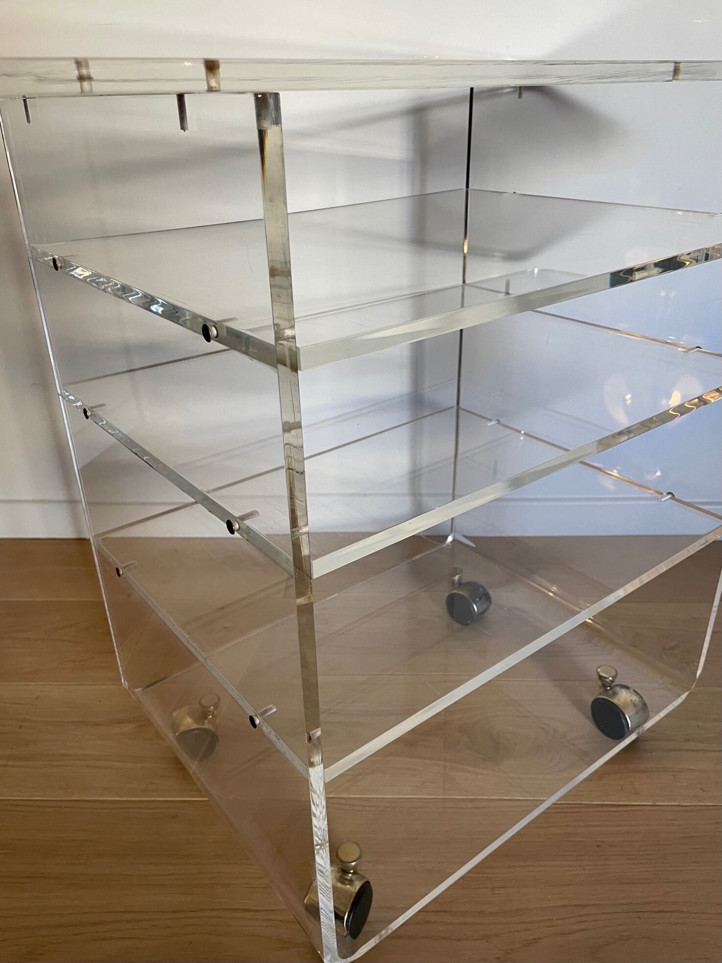 Transparent plexiglass TV stand