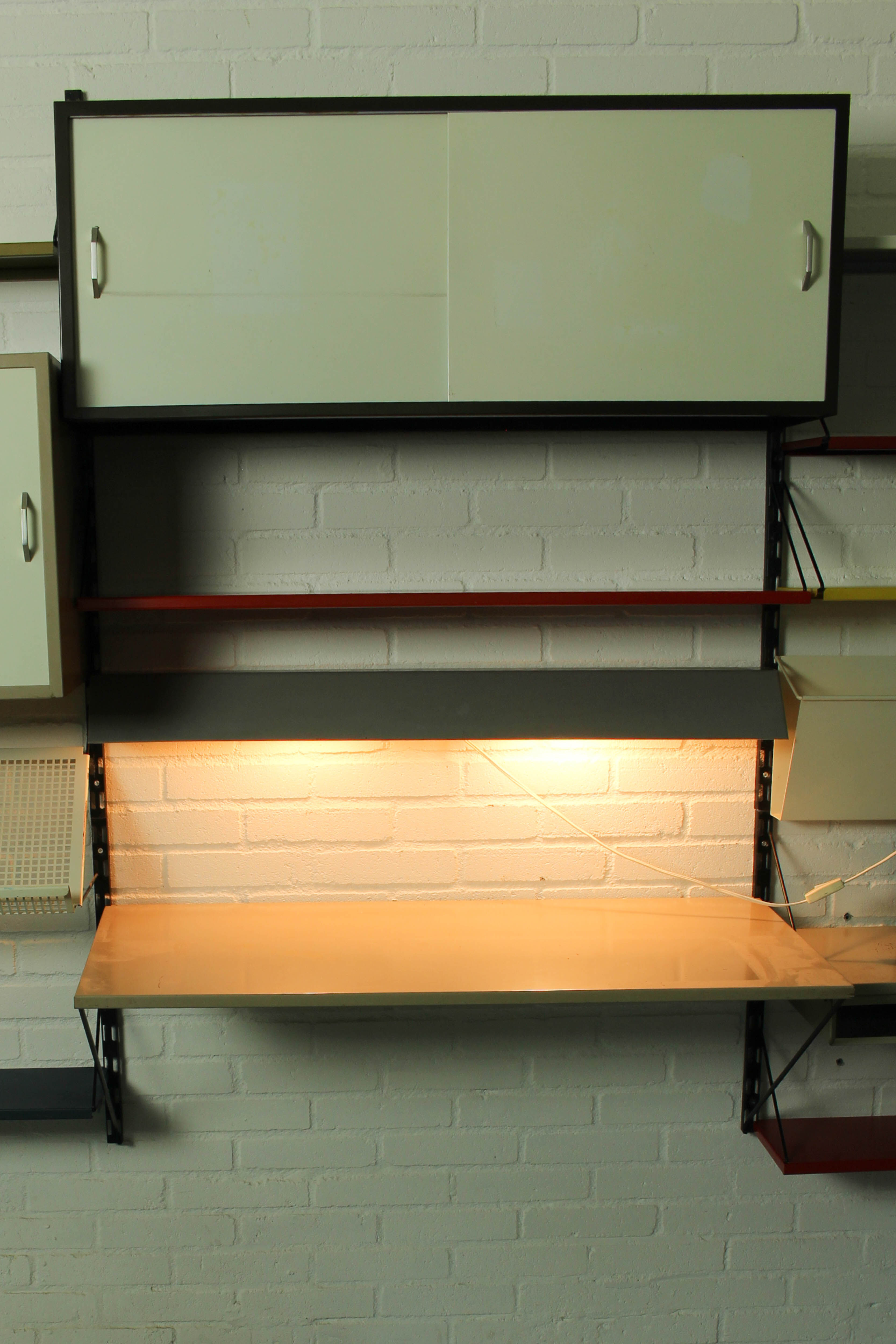 Wall Unit by Tjerk Reijenga for Pilastro with die cut magazine shelve