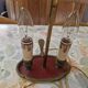 Old silver-plated bronze lamp, except for the arms which are not silver.