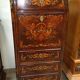 Secretary with a drop-leaf in precious marquetry wood in the Louis XV style.