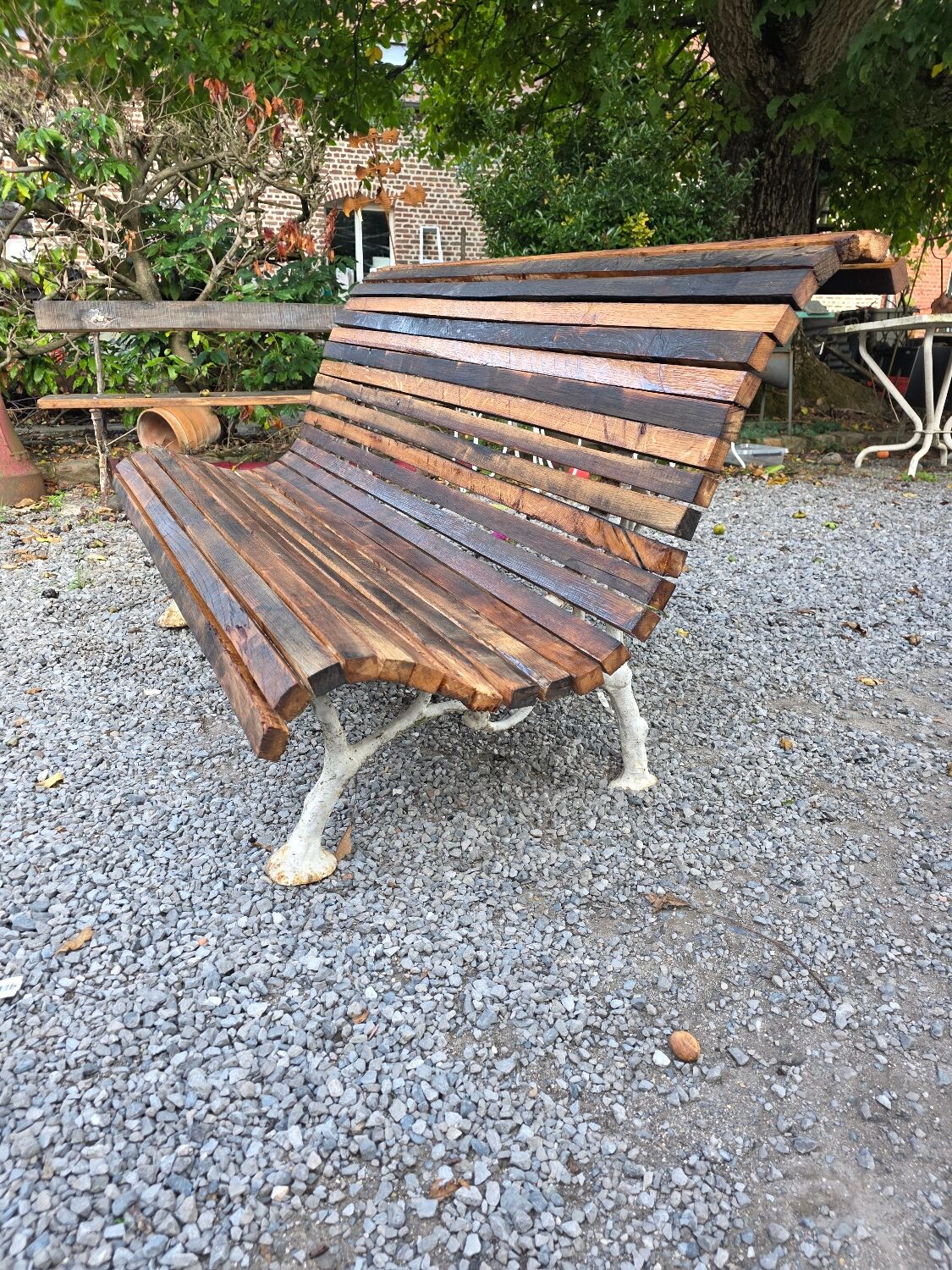 Cast iron and oak slatted garden bench