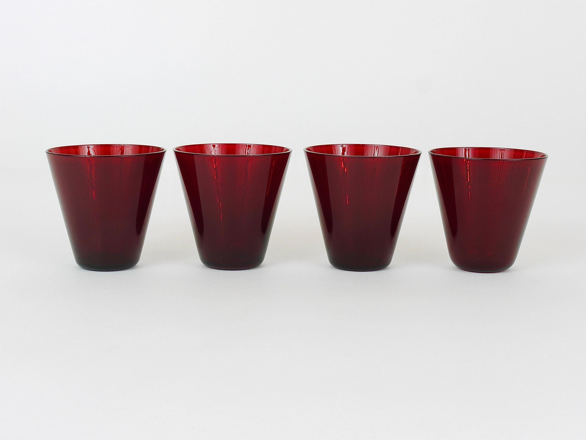 Four Kartio drinking glasses by Kaj Franck, mid-century style, from Nuutajärvi Nottsjö, Finland.